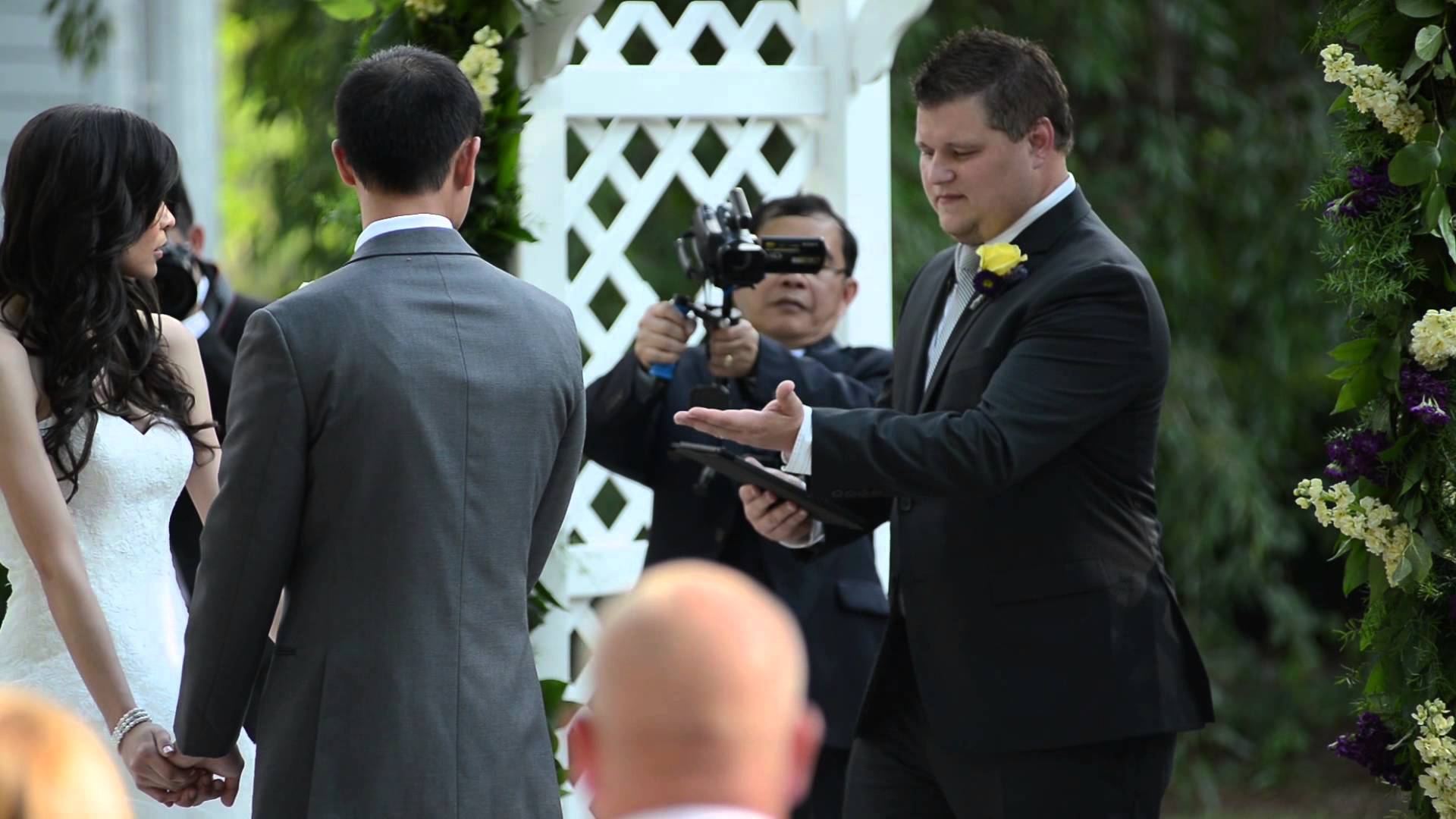 Wedding guests blocking the professionals